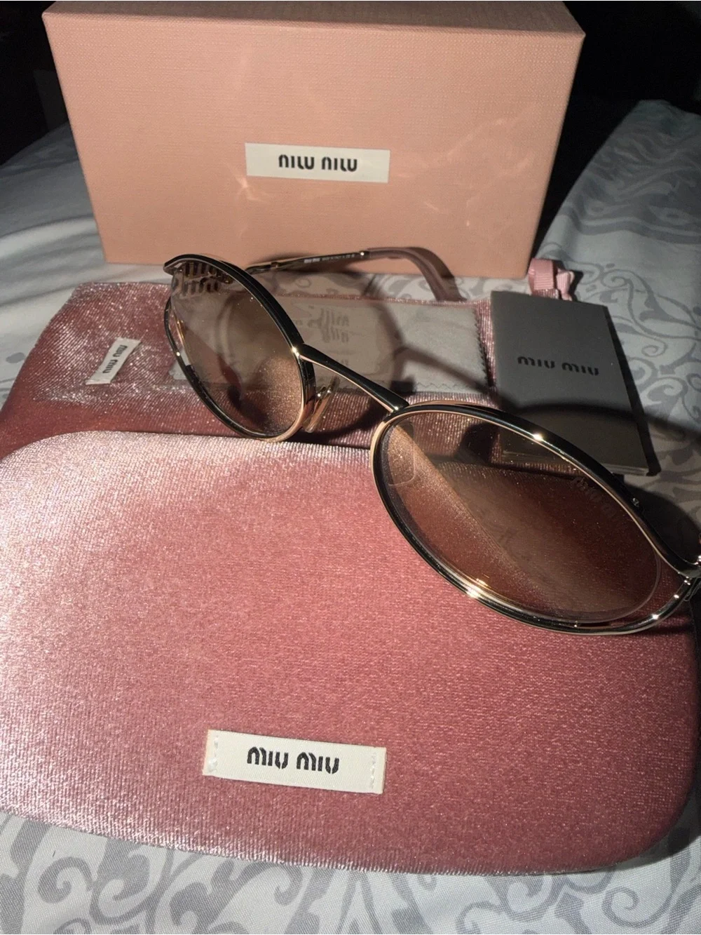 Miu Miu Rose Gold Frame Sunglasses with Pink Gold Lenses